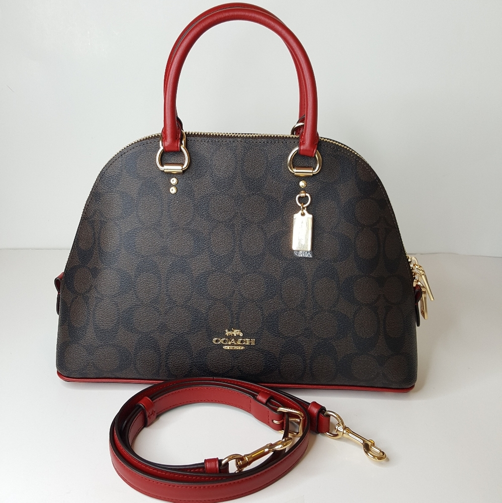 Coach signature leather crossbody bag.